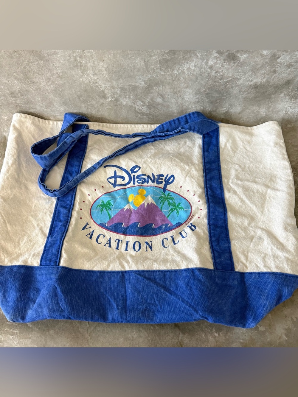Disney Cream Tote with Bold Blue Trim and Colorful Logo (Love 25)